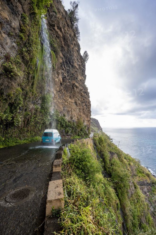 Cascata dos Anjos, car driving through waterfall, coastal road, Madeira, Portugal, Europe