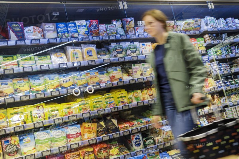 Elderly woman shopping in supermarket, Radevormwald, Germany, Europe