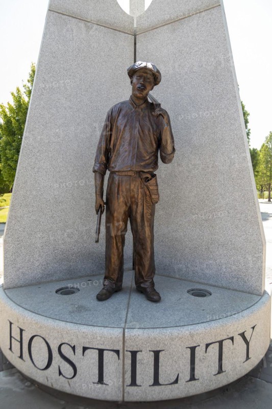 Tulsa, Oklahoma, Hope Plaza at John Hope Franklin Reconciliation Park. The park is a memorial based on the 1921 race massacre in which many African-Americans were murdered and the Greenwood District burned to the ground. The plazas sculpture includes three figures from the race massacre representing Humiliation, Hostility, and Hope