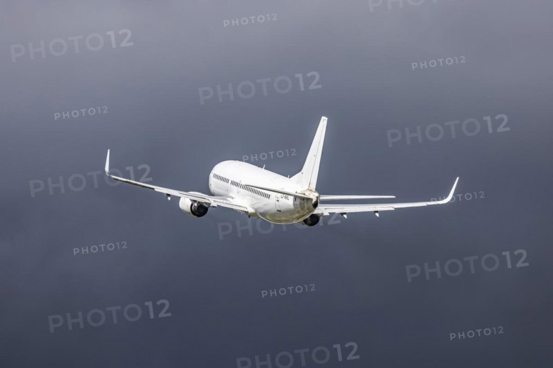 Aircraft of type Boeing 737-300 of the airline BUL AIR during take-off and climb, neutral livery, Stuttgart, Baden-Wuerttemberg, Germany, Europe