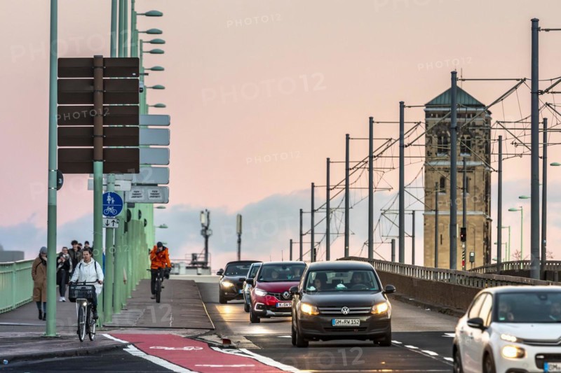 Road traffic on the Deutz Bridge, in the background the church tower of St. Heribert, Cologne, North Rhine-Westphalia, Germany, Europe