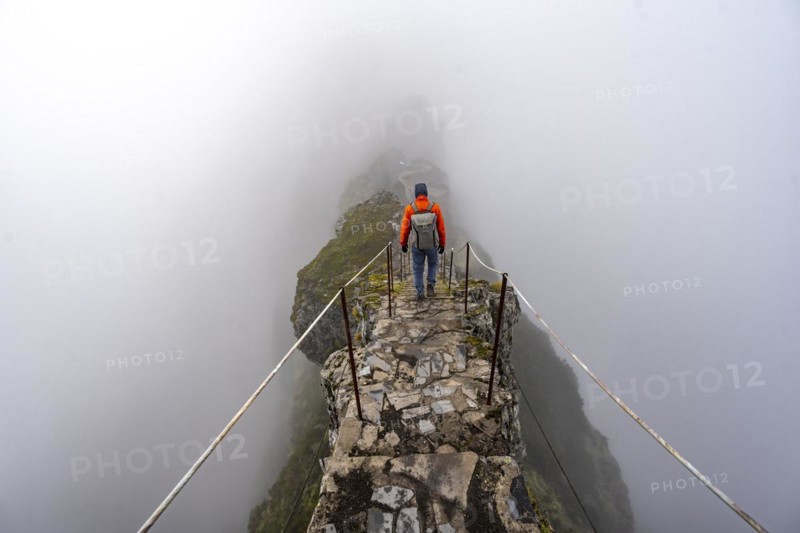 Hikers in the mist