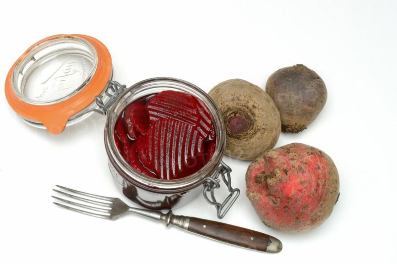 Pickled beetroot in glass jar and beetroot