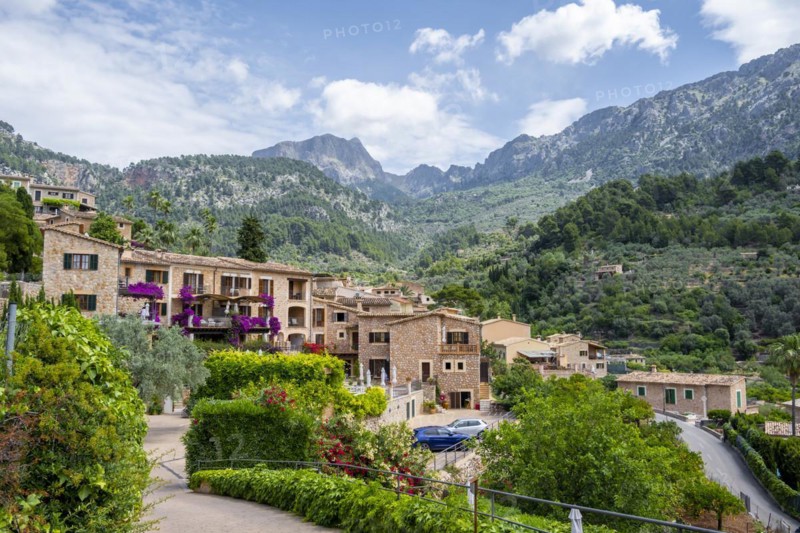 Typical houses of the mountain village Fornalutx with mountain landscape