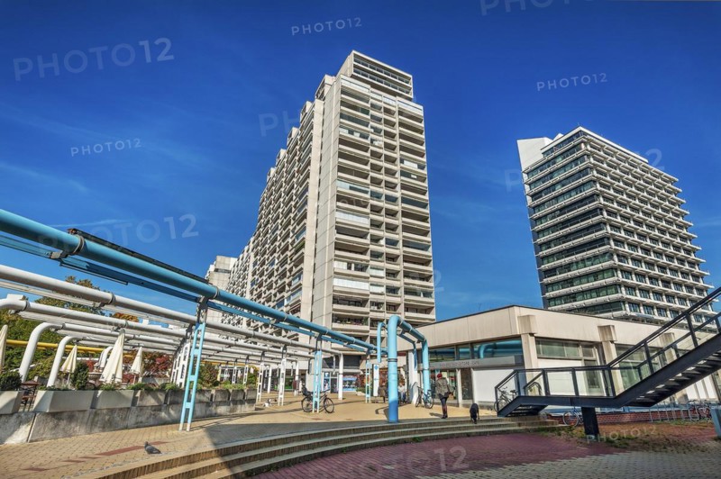 High-rise buildings and blue pipe systems in the former Olympic Village