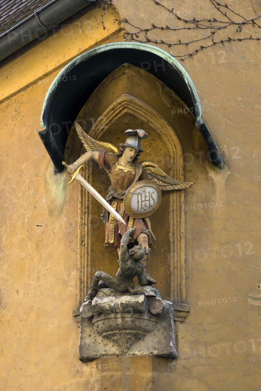Sculpture of St. Michael the Archangel fighting the devil