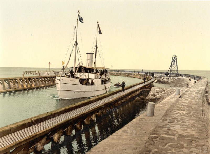 Steamer at the harbour entrance