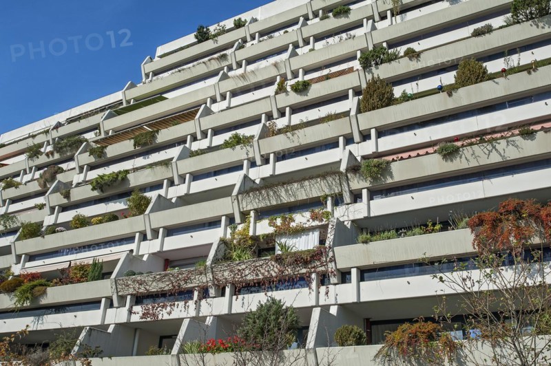 High-rise building with green balconies in the former Olympic Village