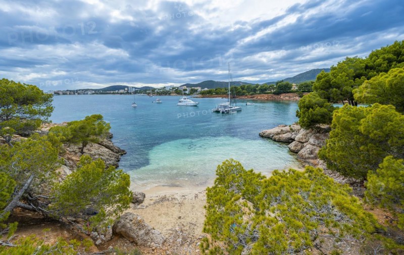 Small bay with sandy beach and blue sea