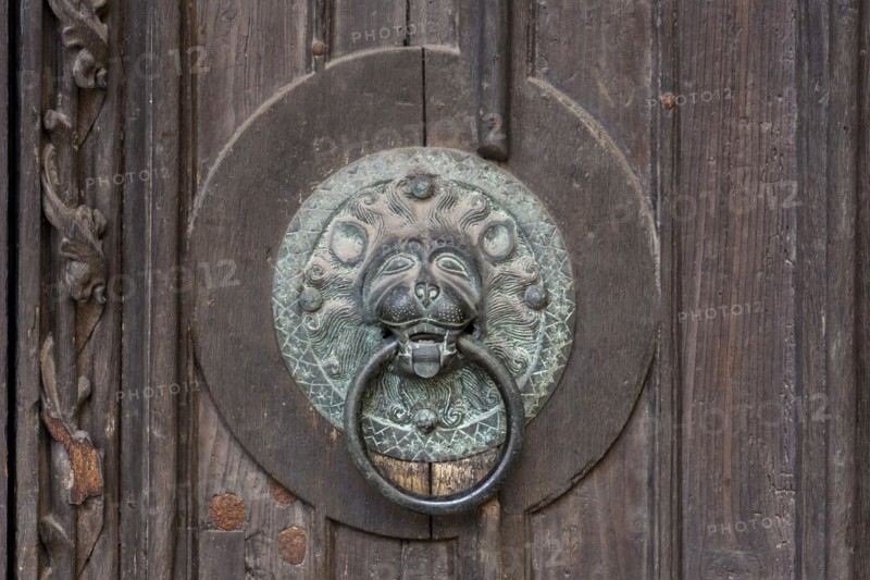 Door knocker with lions head on a door of the Lorenzkirche