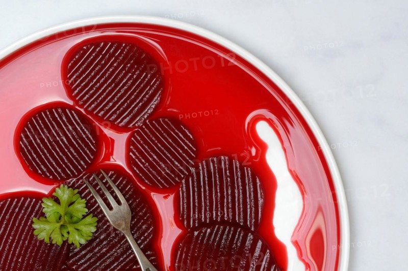 Sliced pickled beetroot on plate