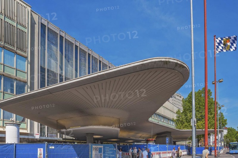 Central station entrance with curved canopy