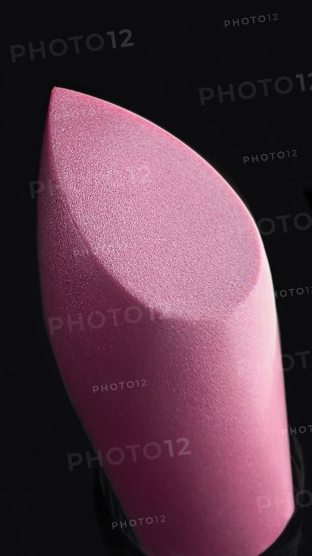 Close-up of lipstick on black background