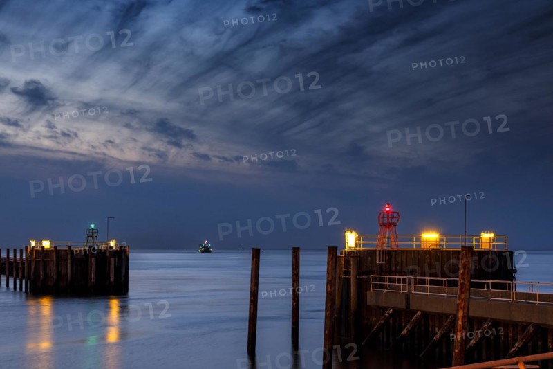 Harbour entrance in Cuxhaven at the mouth of the Elbe at night