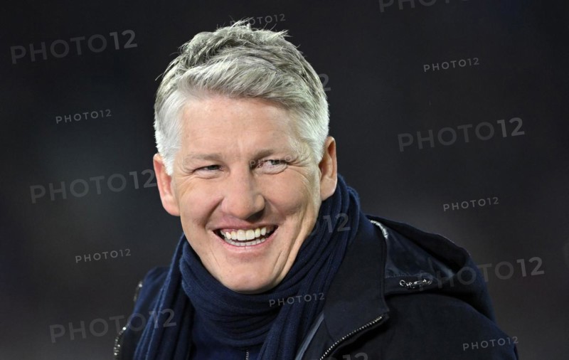 TV pundit Bastian Schweinsteiger laughs
