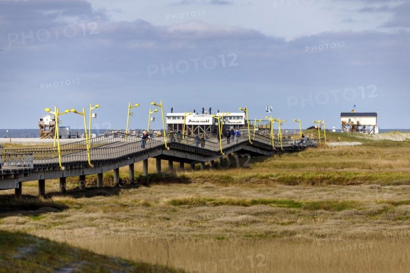 Pier to the typical pile dwellings of Sankt Peter-Ording