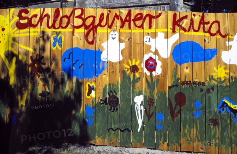 Graffiti on a board wall