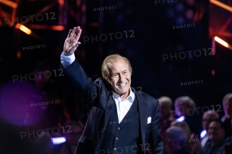 Singer Michael Holm performing on stage. 50 years of ZDF Hitparade