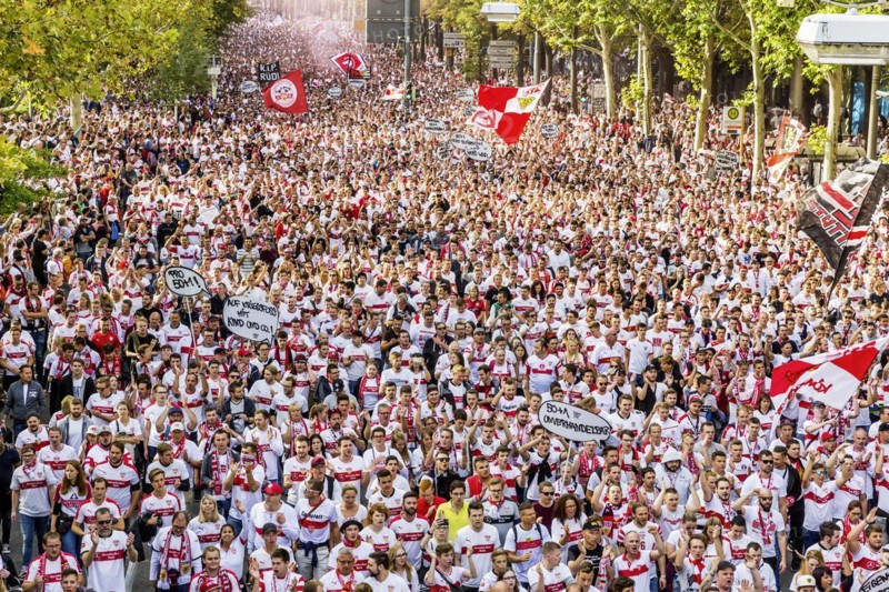 Fans of VfB Stuttgart on their way to the stadium