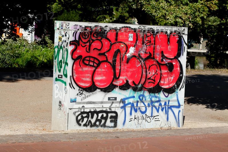 Graffitied colourful electricity distribution board