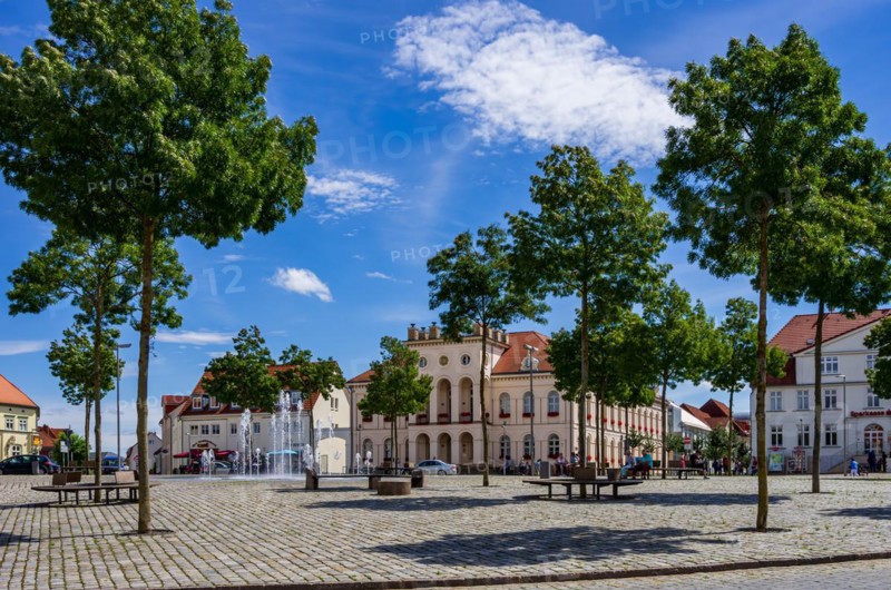 Lively scene in front of the town hall on the historic market square of Neustrelitz