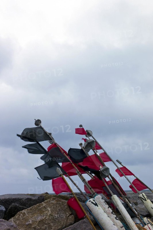 Fishermens marker buoys on the shore of Vitt