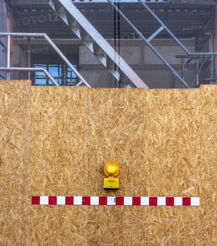 Building fence made of chipboard
