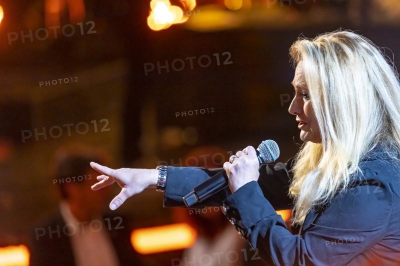 Singer Nicole performing on stage. 50 years of ZDF Hitparade