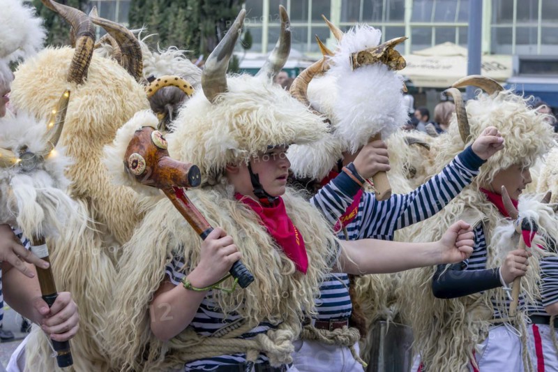 Traditional bell ringer masks in sailors mother