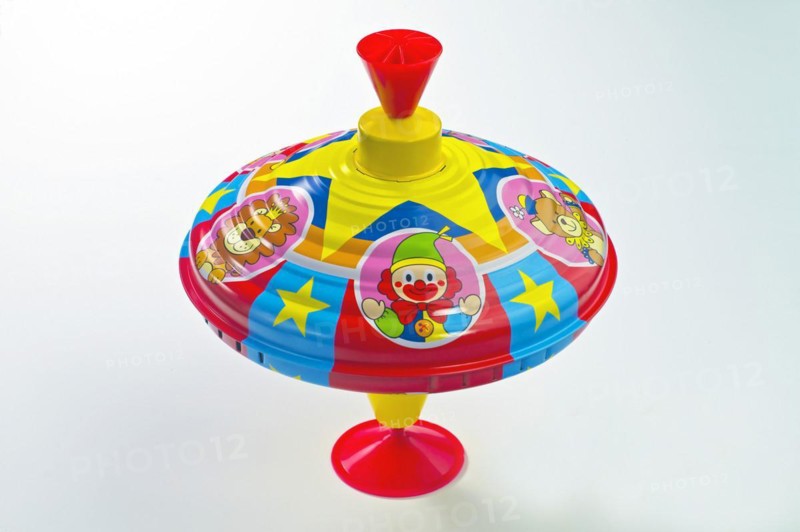 Stationary humming top