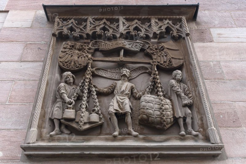 The relief of the scales by Adam Kraft