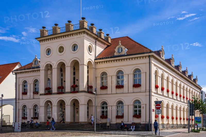 Lively scene in front of the town hall on the historic market square of Neustrelitz