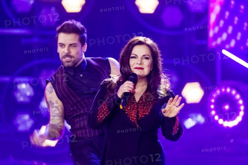 Singer Marianne Rosenberg performing on stage. 50 years of ZDF Hitparade