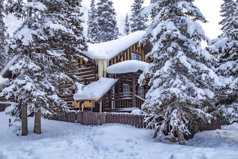 Snowy cabin in winter landscape at Chateau Lake Louise Hotel