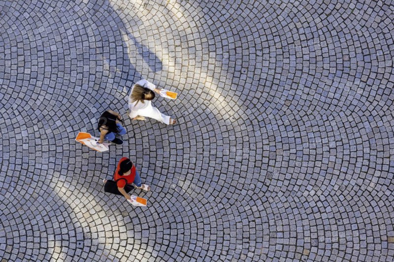 Three people from a birds eye view