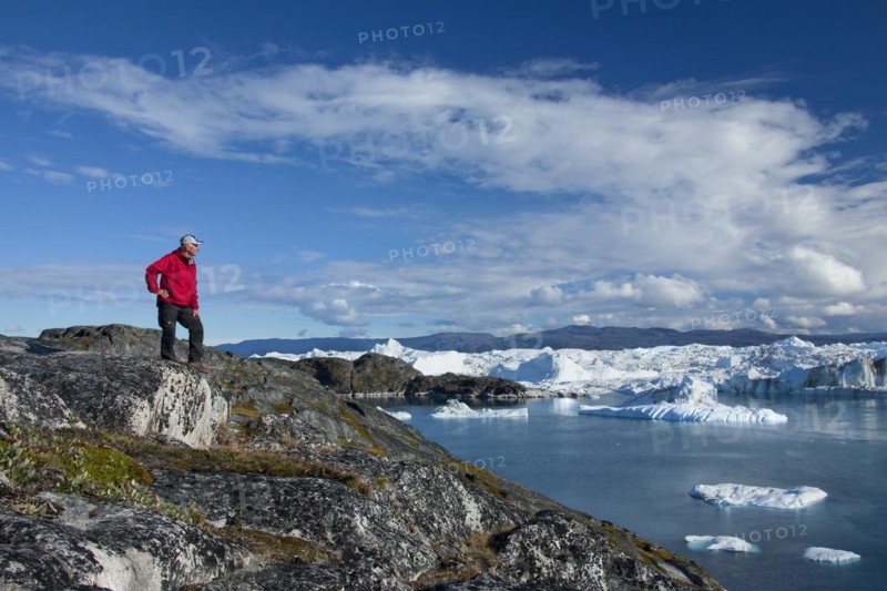 Tourist looking at Kangia Icefjord