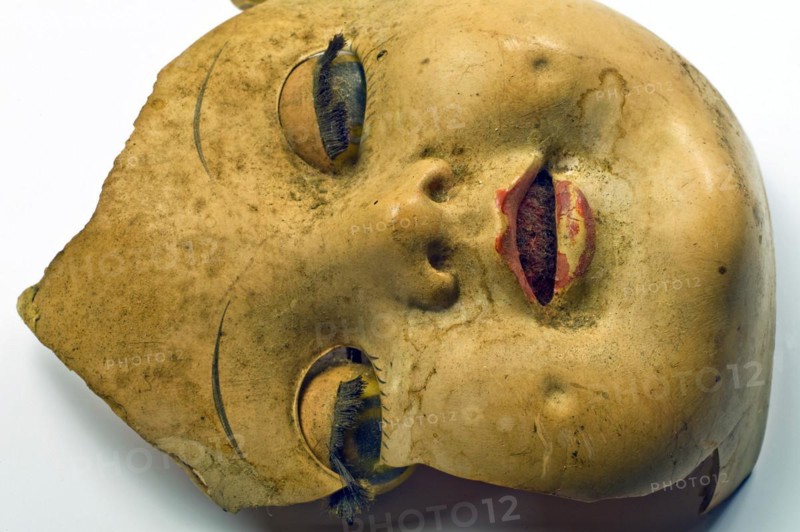 Broken doll head