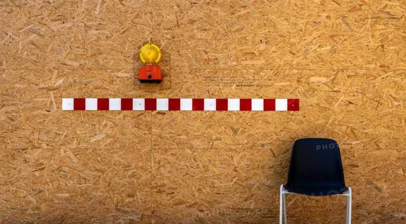 Building fence made of chipboard