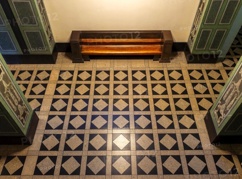 Wooden bench in retro style in the vestibule of Spandau Town Hall