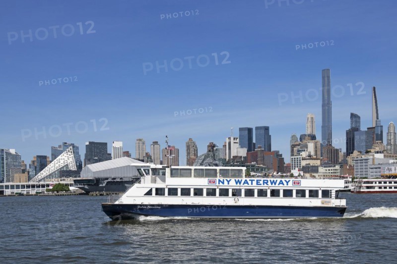 Ferry across the Hudson River in front of the USS Intreprid Sea-Air-Space Museum
