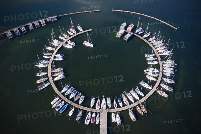 Aerial view over sailing boats docked in the Burgtiefe marina at on Fehmarn
