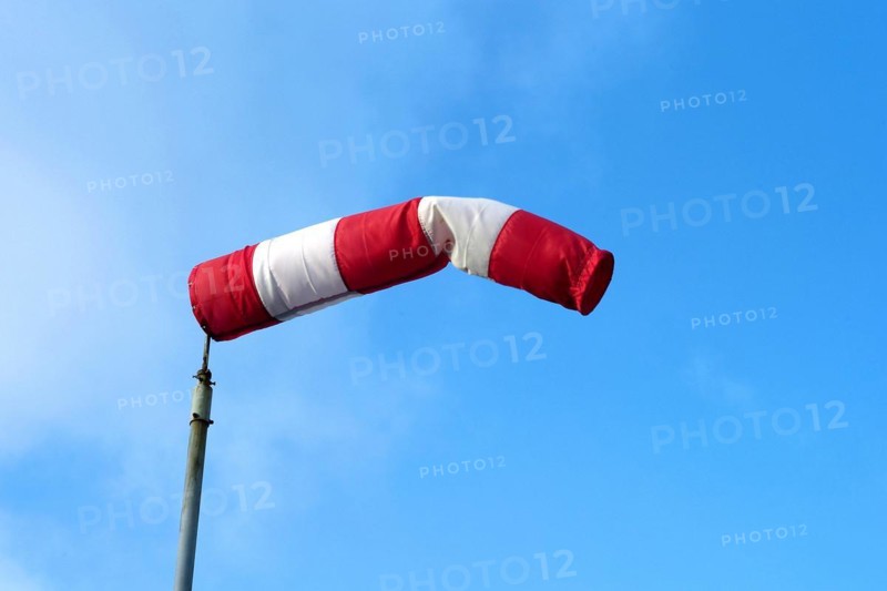 Windsock against a blue sky
