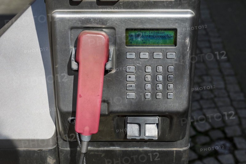 Payphone in the pedestrian zone main street