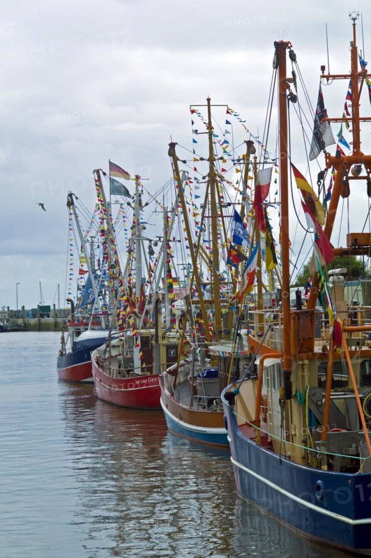 Decorated crab cutter in the harbour of Neuharlingersiel