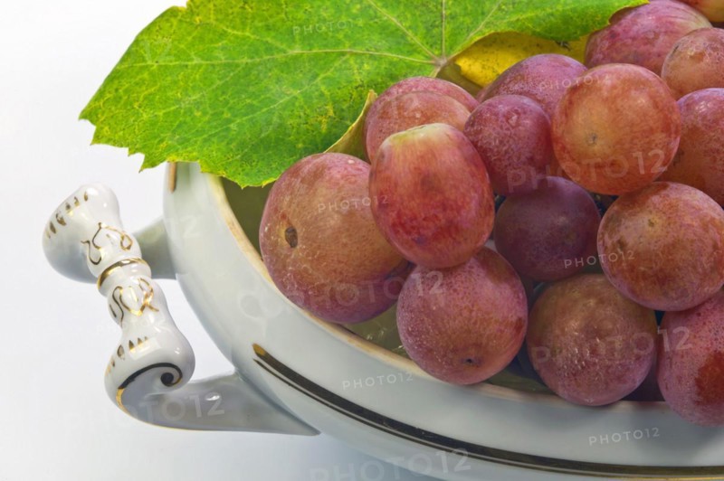 Grapes in an old porcelain bowl