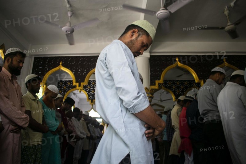 Indian Muslims perform the second Friday prayer in the holy month of Ramadan at a Mosque in Guwahati