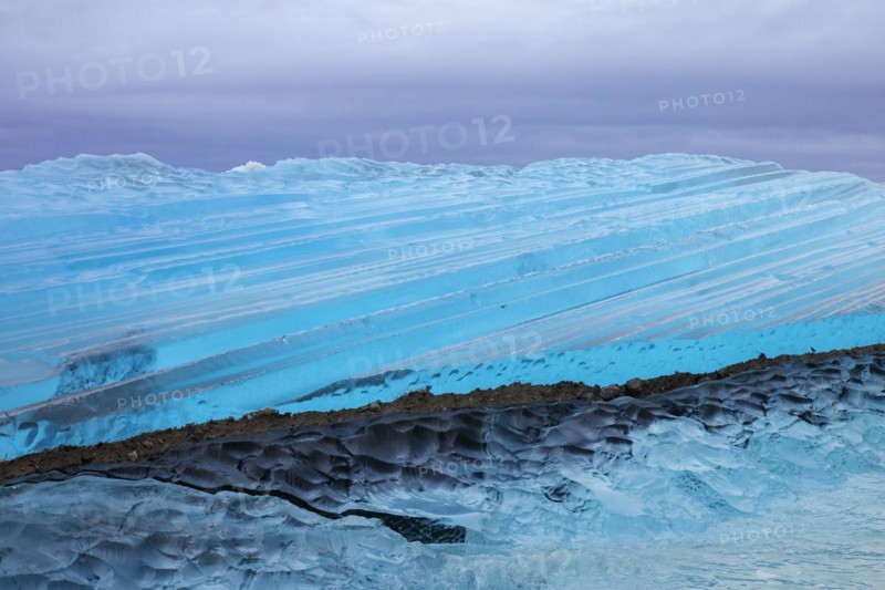 Blue ice abstract close-up of the Negribreen glacier at Spitsbergen