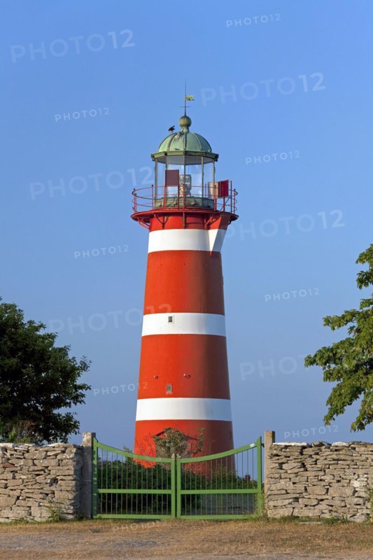 The red and white lighthouse Naers fyr at Naersholmen on the island Gotland