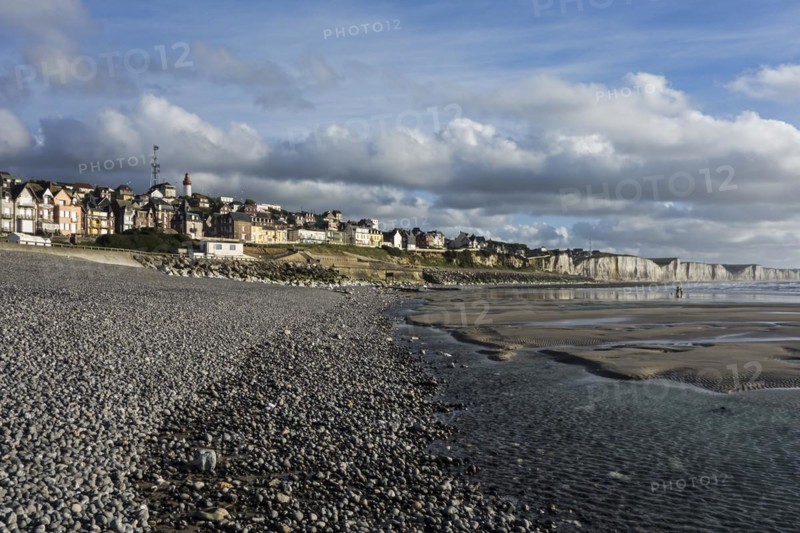 View over the chalk cliffs and the village Ault seen from the pebble beach