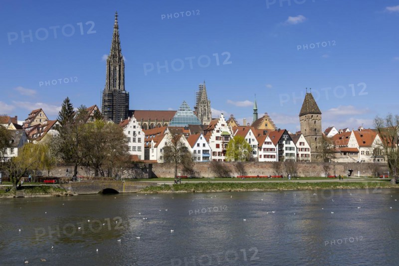 Danube and Danube promenade with Ulm city wall and Ulm Cathedral behind